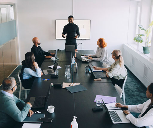 services-man-presenting-in-conference-room services-man-presenting-in-conference-room